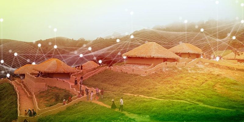 Rural village in India with traditional huts connected by a digital network overlay, representing internet connectivity and Digital India initiatives