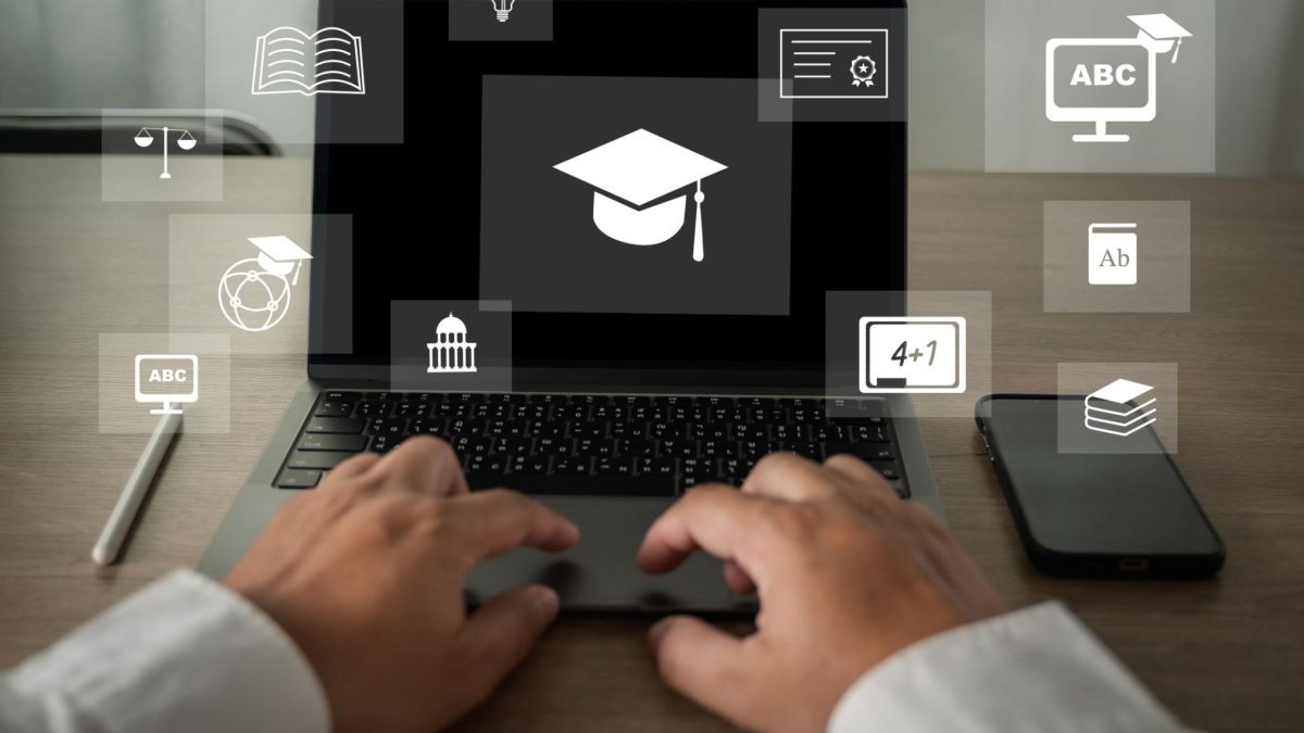 Person typing on a laptop displaying a graduation cap icon, surrounded by digital education symbols representing online learning and skill development.
